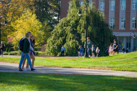 students walking across campus