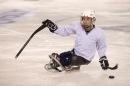 Dan Santos '17 practices sled hockey at the Whitt for the Northeast Passage Wildcats team